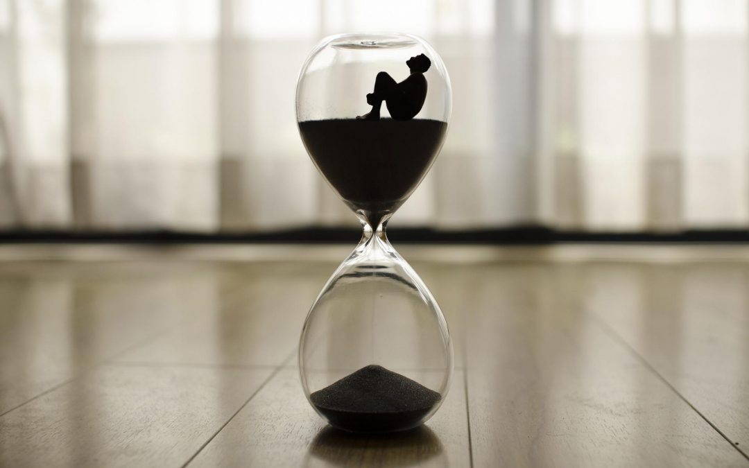 Person sat inside hourglass