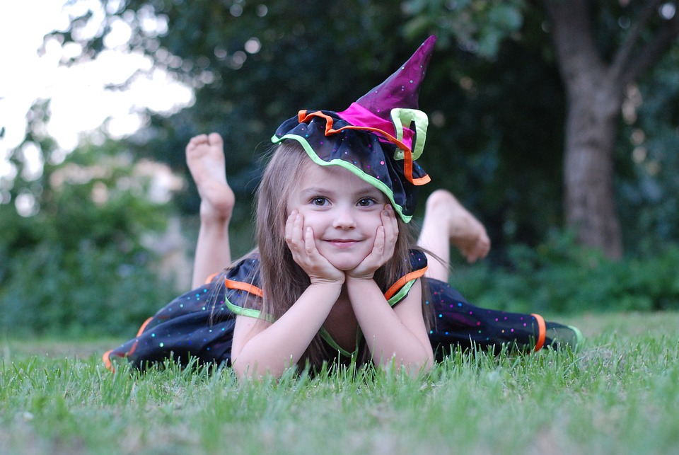 Little girl in witch costume