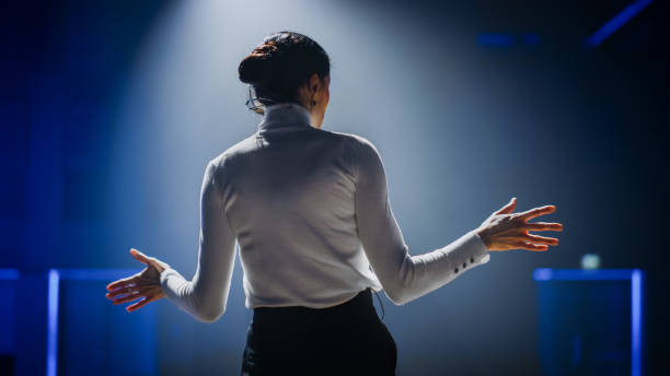 Woman speaking with a microphone attached