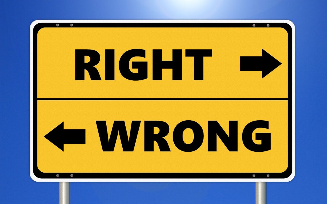 Sign with one direction labelled 'RIGHT' and other direction labelled 'WRONG'
