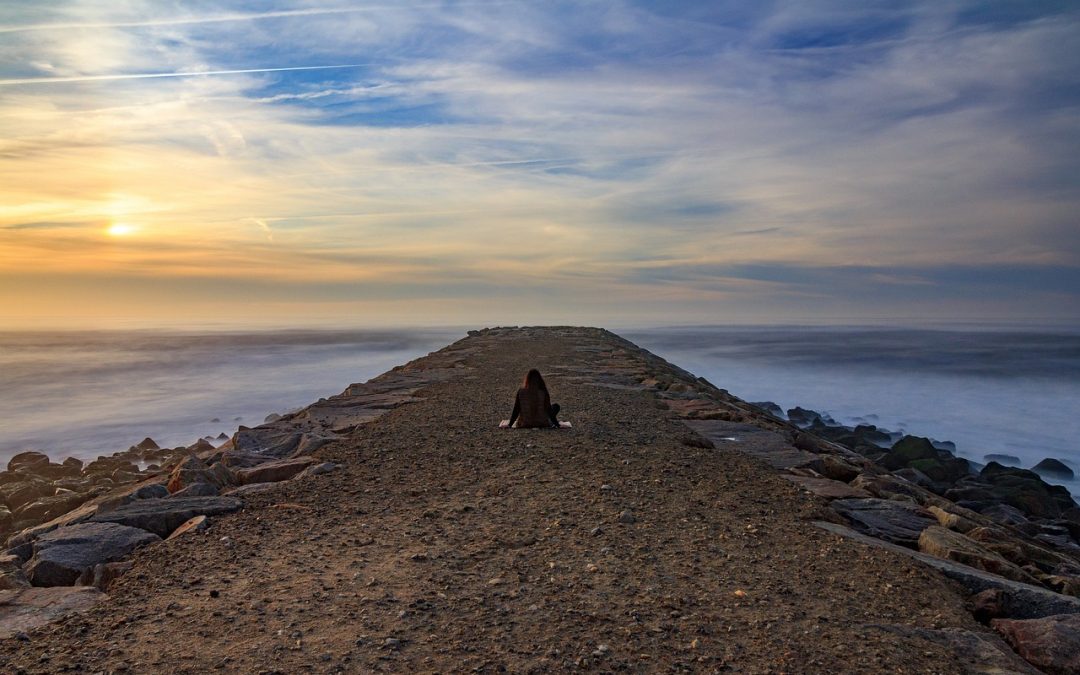 Woman looking at sunset